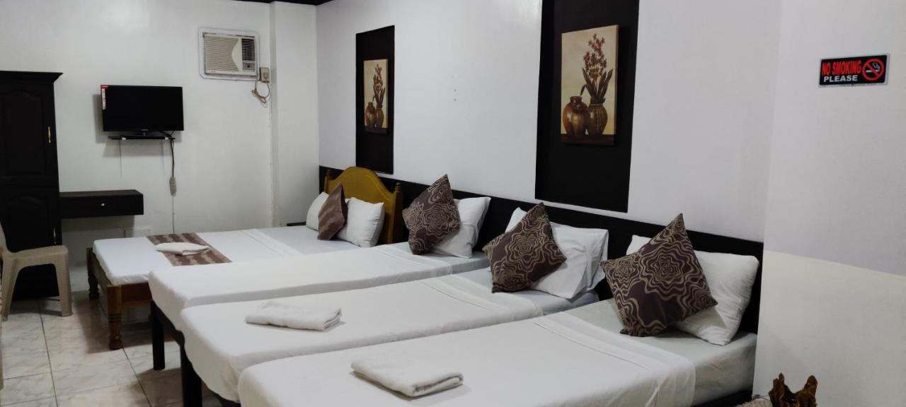 Center Parkway Pension House Калибо Экстерьер фото