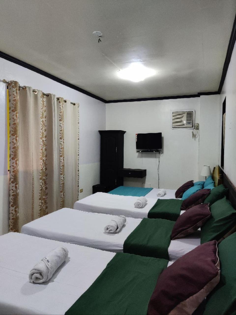Center Parkway Pension House Калибо Экстерьер фото